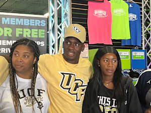 Andrew Harris Celebrating His Commitment to UCF with Family